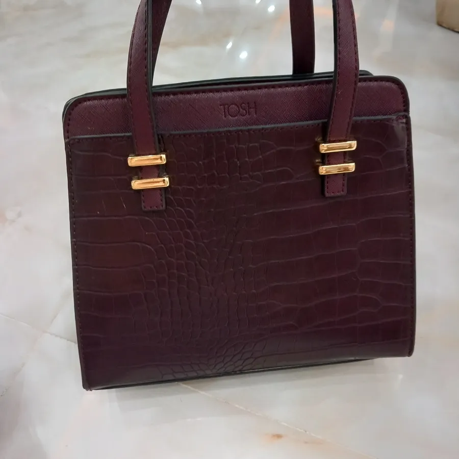 کیف چرم زرشکی