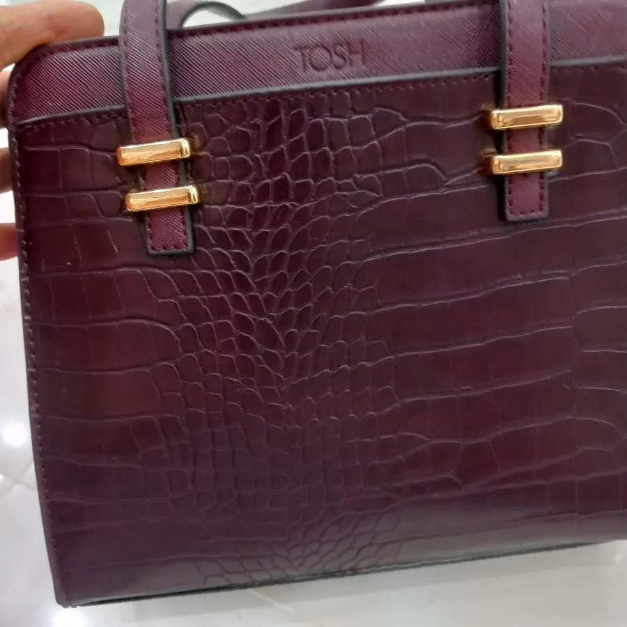 کیف چرم زرشکی