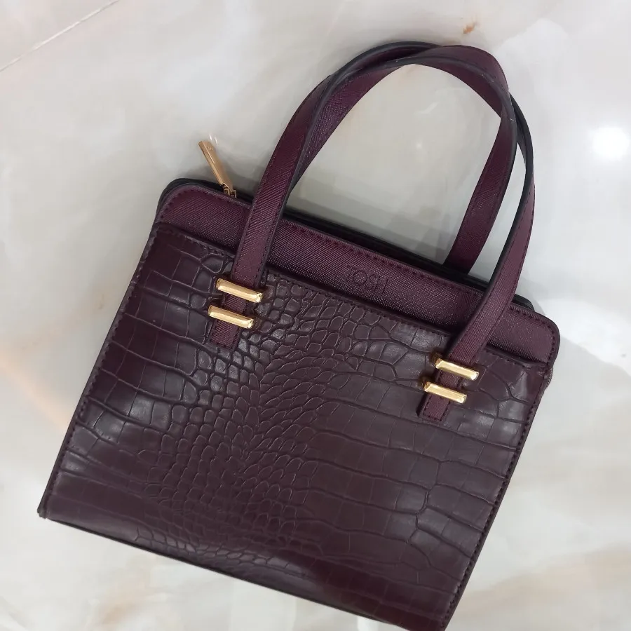 کیف چرم زرشکی