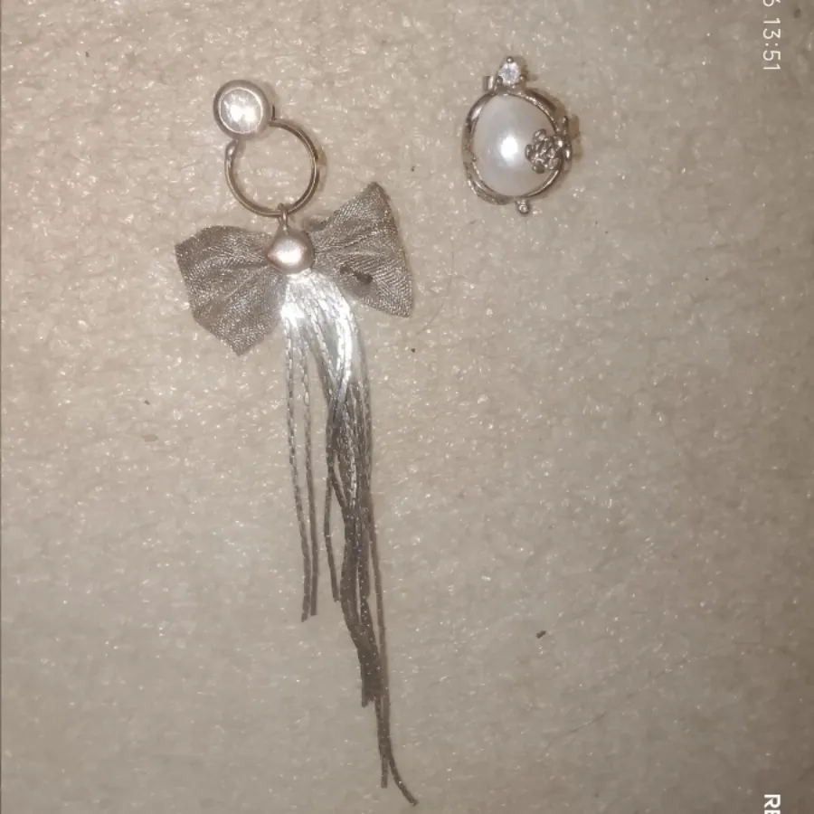 گوشواره لنگه به لنگه
