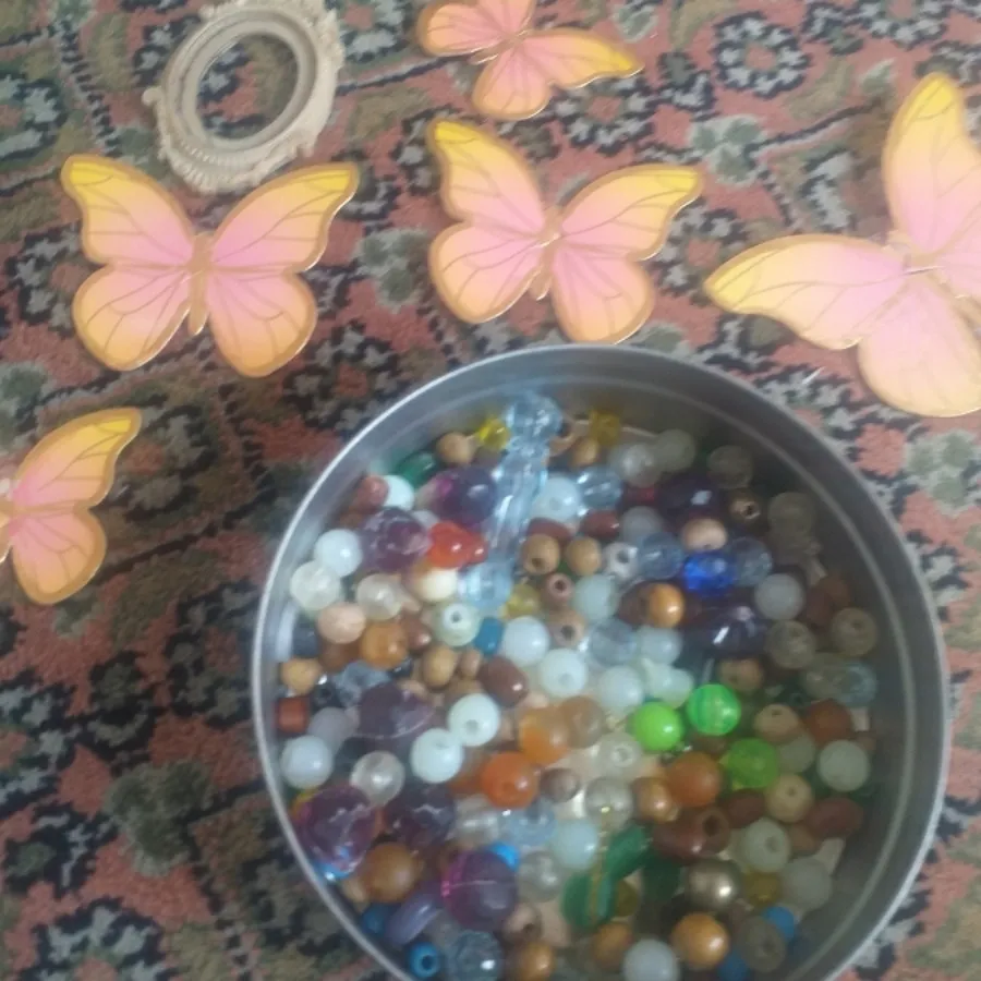 مهره گردنبند وپروانه