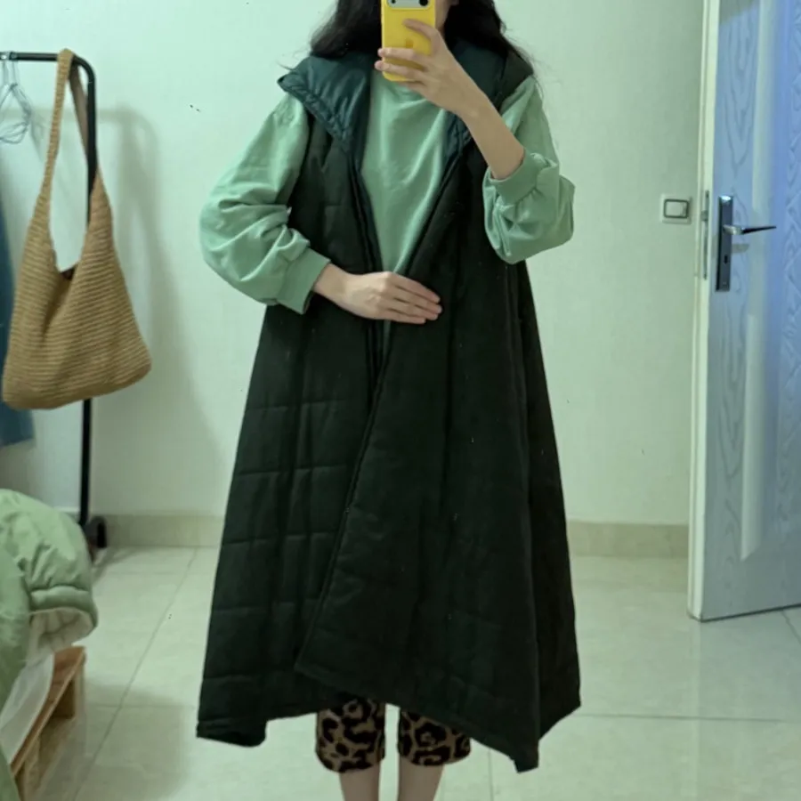 کاپشن کلاه دار سبز?