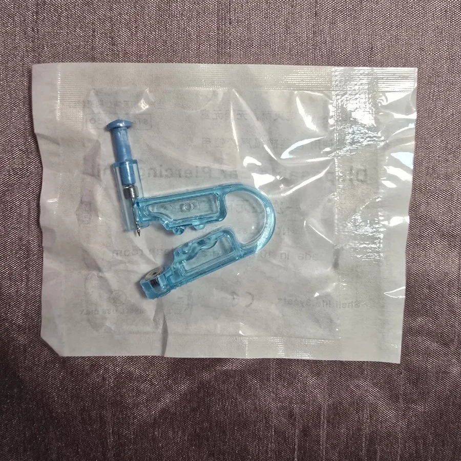 دستگاه پانچ گوش خانگی